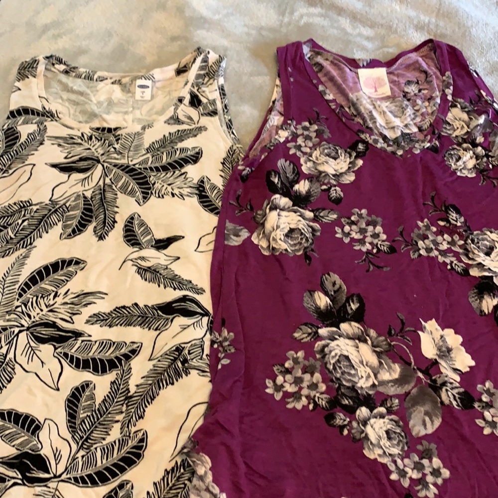 Two tank tops. Black and white tank top and purple and gray/white